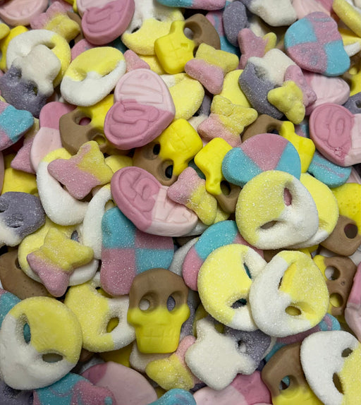 Assorted colorful candy pieces including hearts, stars, and other shapes.